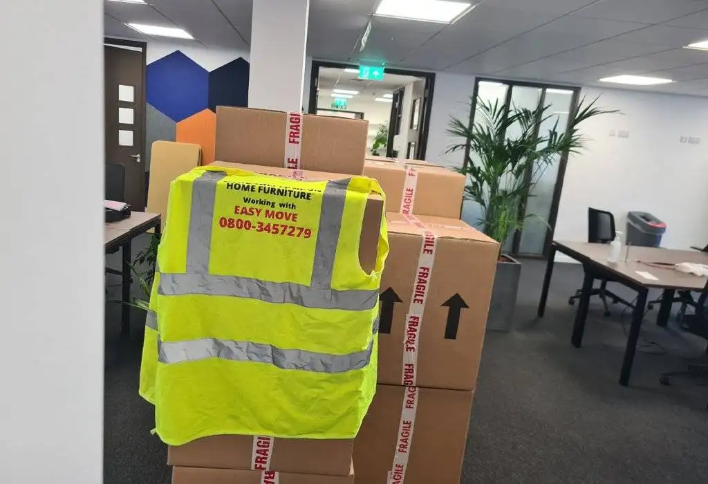 There are the packed boxes of luggage of the office and are ready for loading in trucks for moving