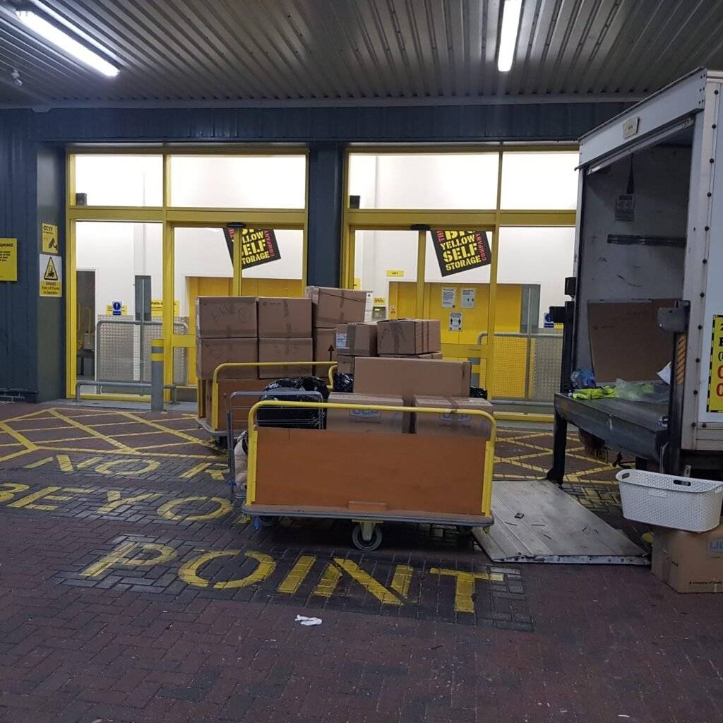 there is unloading of back stuff from the tracks into the storage unit