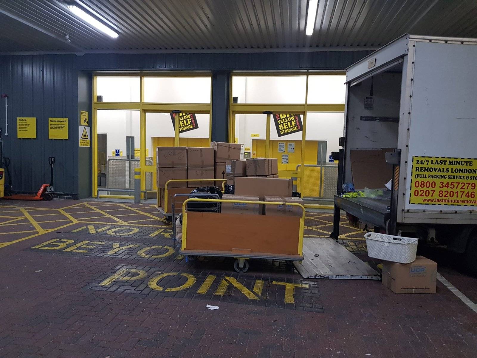 there is unloading of back stuff from the tracks into the storage unit